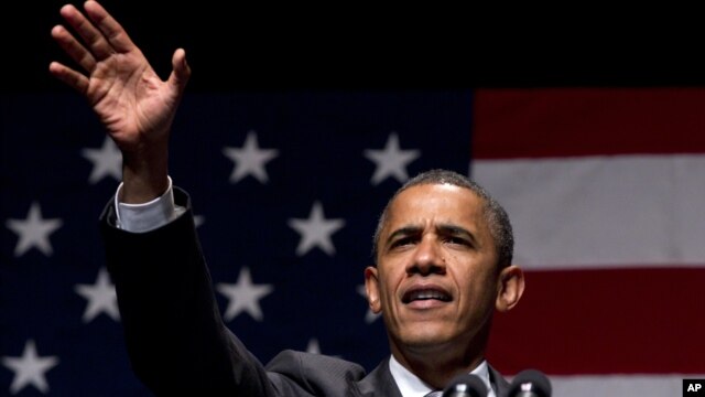 President Barack Obama speaks during a campaign fundraising concert in Miami Beach, Florida, June 26, 2012.