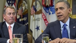 President Barack Obama, accompanied by House Speaker John Boehner of Ohio, speaks to reporters in the Roosevelt Room of the White House in Washington, November 16, 2012.