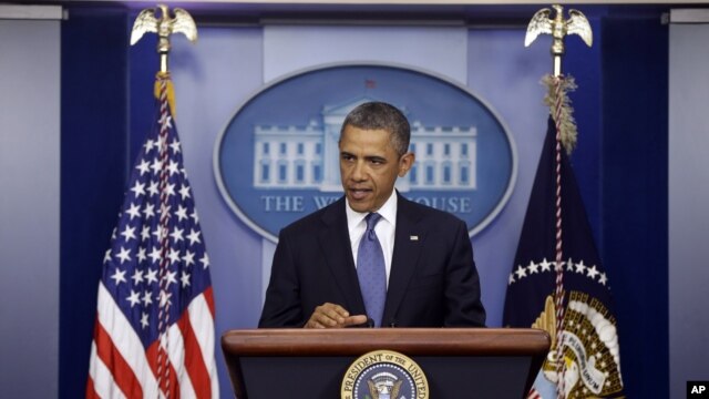 President Barack Obama speaks to reporters in the Brady Press Briefing Room at the White House in Washington after meeting with Congressional leaders regarding the fiscal cliff, December 28, 2012. 