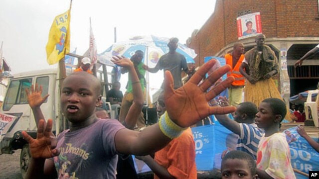 In the final week before Congo's elections, campaign trucks - like this one for the ruling party that at one time enjoyed immense popularity in the east - drive down the dirt roads of the North Kivu regional capital, Goma, November 2011.