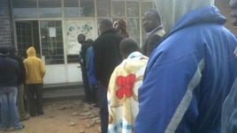 Zimbabweans at a polling station Wednesday
