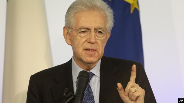 talian Premier Mario Monti gestures as he speaks during a news conference in Rome, December 23, 2012. 