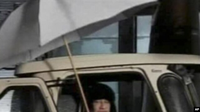 In this video image broadcast on Libyan state television early Tuesday Feb. 22, 2011, Libyan leader Moammar Gadhafi is shown.