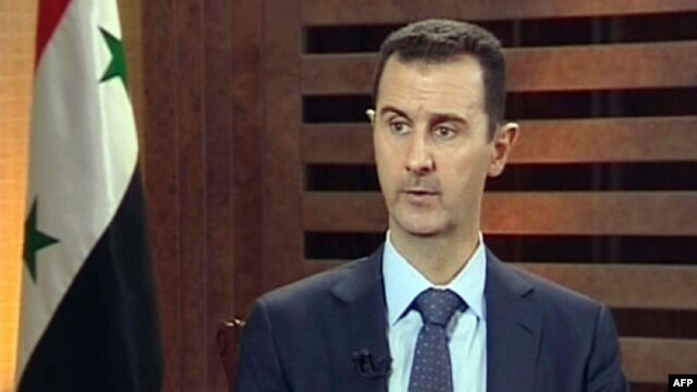 Tổng thống Syria  Bashar al-Assad phát biểu trong một cuộc phỏng vấn tại Damascus, ngày 29/8/2012