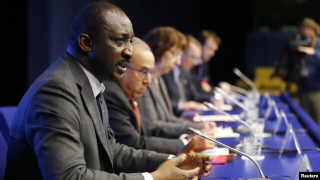 Mali's Foreign Minister Tieman Hubert Coulibaly addresses a news conference after a ministerial meeting in support of Mali at the EU Council in Brussels, February 5, 2013.