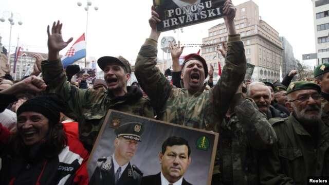 People celebrate after appeals court overturns convictions of Ante Gotovina and Mladen Markac in Zagreb, November 16, 2012.