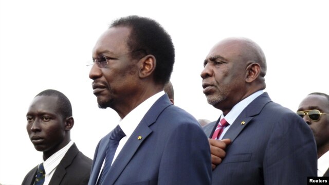 Mali's interim President Dioncounda Traore (C) in the capital Bamako, July 27, 2012.