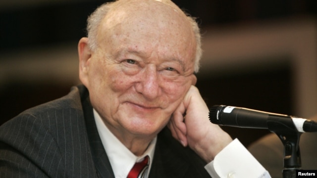 In this April 18, 2007 photo, former New York Mayor Ed Koch listens during the 9th annual National Action Network convention in New York.