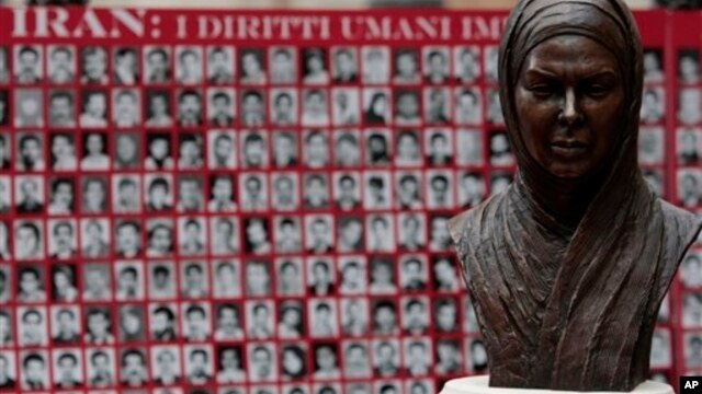 Bust of Neda Agha Soltan, a student killed during Tehran's 2009 election protests, before pictures of what rights advocates say are victims of Iranian human rights violators, Rome, Feb. 11, 2010.