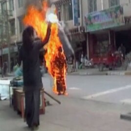 Still image of Tibetan Palden Choetso's self-immolatation.