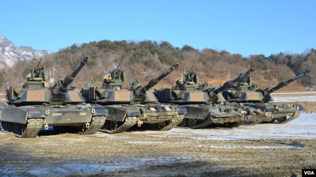 M1-A2SEP Abrams tanks participating in a platoon qualifying exercise near the DMZ. (Photo: VOA / Steve Herman)     