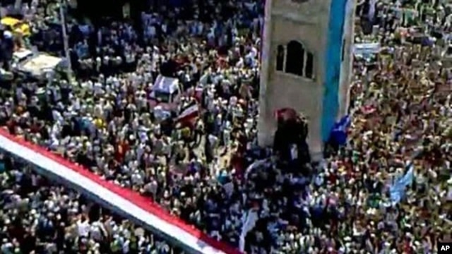 An image taken from footage uploaded on YouTube shows hundreds of thousands of Syrian anti-government protesters flooding the streets of the central city of Hama, July 1, 2011