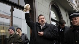 Member of Just Russia political party Gennady Gudkov, center, near Bolotnaya square, Moscow, Dec. 10, 2011.