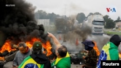 En Fotos |  Derrota de Bolsonaro en las urnas aviva protestas de camioneros en Brasil