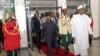 FILE - Nigeria's President Muhammadu Buhari leaves the State House after a presentation to the National Assembly in Abuja, Nigeria, Oct. 7, 2022.