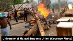 Students at the University of Malawi burn firewood to protest closure of the university on Nov. 2, 2022, in Blayntyre, Malawi, and the reduction of the academic year to one semester. (Photo courtesy University of Malawi Students Council) 