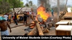 Students at the University of Malawi burn firewood to protest closure of the university on Nov. 2, 2022, in Blantyre, Malawi, and the reduction of the academic year to one semester. (Photo courtesy of University of Malawi Students Council) 