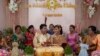 Leang Phannara and Kim Bethyliza attend their traditional Khmer wedding ceremony after it was delayed for months due to the coronavirus disease (COVID-19) restrictions in Phnom Penh, Cambodia January 29, 2021. (REUTERS/Cindy Liu) 