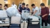 FILE - Chinese workers are seen after arriving at Gwadar Airport, in Gwadar, Pakistan Oct. 3, 2017.