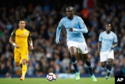 Manchester City's Yaya Toure controls the ball against Brighton & Hove Albion in 2018. (Martin Rickett/PA via AP)