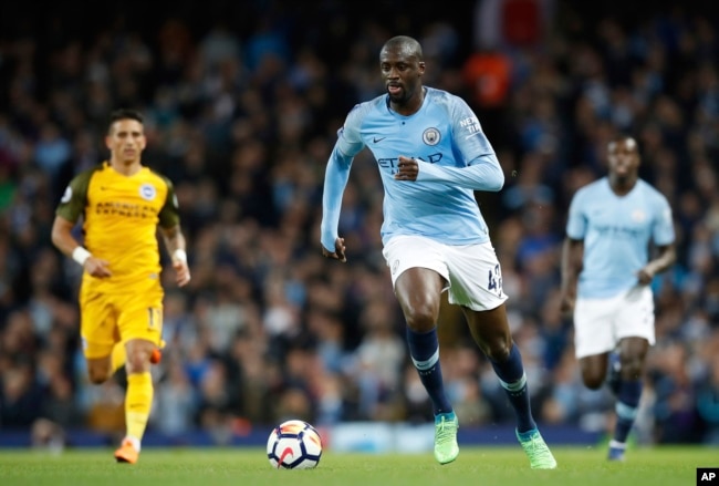 Manchester City's Yaya Toure controls the ball against Brighton & Hove Albion in 2018. (Martin Rickett/PA via AP)