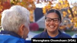Ohio's state senator Tina Maharath (right), the first Asian-American woman elected to the Ohio Senate, talked to her constituent ahead of the November 2022 midterm election.