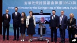 European lawmakers who are part of the Inter-Parliamentary Alliance on China gather during a press conference at the Ministry of Foreign Affairs in Taipei, Taiwan, Nov. 3, 2022. 