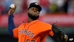 Houston Astros starting pitcher Cristian Javier throws during Game 4 of baseball's World Series between the Houston Astros and the Philadelphia Phillies, Nov. 2, 2022, in Philadelphia.