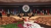 Algerian President Abdel Mejid Tebboune and Arab League Secretary-General Ahmed Aboul Gheit attend a session of the Arab League summit, Algeria, Nov. 2, 2022. (Algerian Presidency/Handout via Reuters)