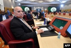 FILE - Iraq's Foreign Minister Fouad Hussein attends the opening session of the preparatory meeting of Arab foreign ministers, in Algerian capital Algiers, Oct. 29, 2022.