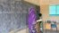 FILE - A teacher leads her classroom in a school on the outskirts of Ouallam, Niger, on Oct. 26, 2022. Africa needs to recruit at least 15 million teachers by 2030 to address a shortage in primary and secondary schools, UNESCO says.
