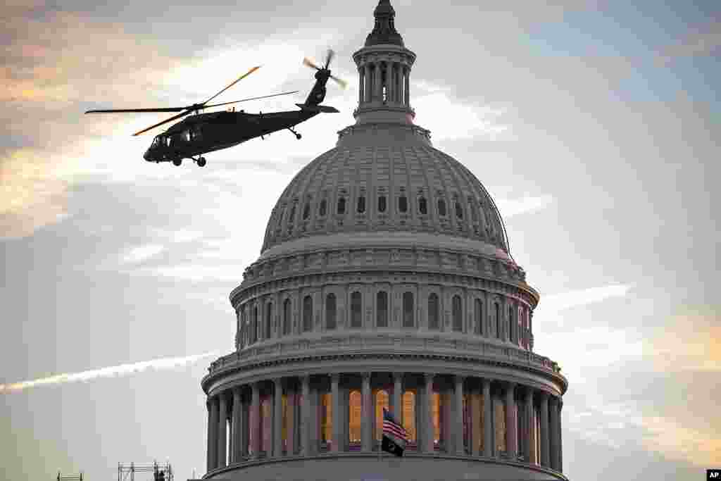 Military helicopters take off from the West Lawn of the Capitol during a casualty evacuation exercise by the U.S. Capitol Police, in Washington.
