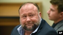 FILE - Infowars founder Alex Jones appears in Connecticut Superior Court in Waterbury, Conn., on Sept. 22, 2022. On Thursday, a judge ordered Jones and his company to pay an extra $473 million for promoting false conspiracy theories about the Sandy Hook massacre that killed 26.