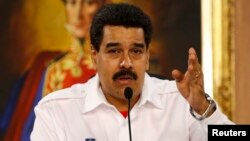Venezuela's President Nicolas Maduro speaks during a meeting with mayors and governors at Miraflores Palace in Caracas, Jan. 8, 2014.