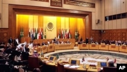 Arab League's emergency meeting in Cairo.