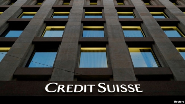 FILE - The Credit Suisse logo is pictured on a bank in Geneva, Switzerland, Oct. 17, 2017.