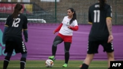 FILE - Former Afghanistan women's football captain Khalida Popal attends a training session in south London, April 09, 2018.