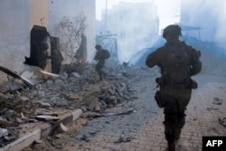 This photo released by the Israeli army on Aug. 23, 2024, reportedly shows Israeli soldiers operating in the Gaza Strip.