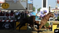 El jockey mexicano Mario Gutiérrez, ganó el Preakness Stakes en Baltimore con "I´ll Have Another", superando en la meta a Bodemeister.