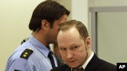 Accused Norwegian Anders Behring Breivik arrives at the courtroom, in Oslo, Norway, April 17, 2012. 