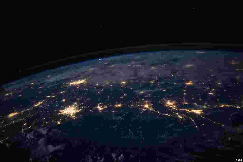 One of the Expedition 40 crew members aboard the International Space Station photographs this nighttime image showing city lights in at least half a dozen southern states from some 225 miles above the home planet. Lights from areas in the Gulf Coast states of Texas, Louisiana, Mississippi and Alabama, as well as some of the states that border them on the north, are visible.