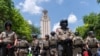 Texas State troopers stand guard during pro-Palestinian protests aginst the Israeli onslaught on Gaza in response to Hamas' October 7 attack at the University of Texas in Austin, Texas, on April 29, 2024.
