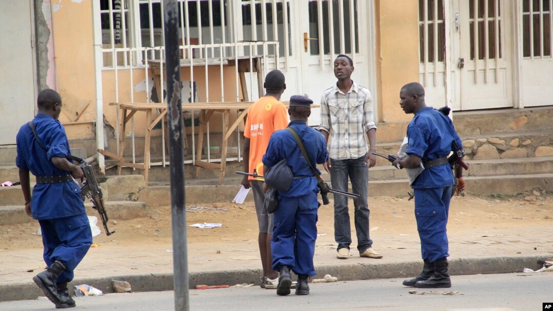 FILE- Police arrest a man following grenade attacks in the capital Bujumbura, Burundi Wednesday, Feb. 3, 2016.