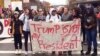Protesters gather on the campus of the University of Connecticut to show their opposition to the election of Republican Donald Trump as president on Nov. 9, 2016 in Storrs, Conn.