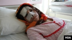 FILE - Reza Gul was hospitalized after being attacked by her husband. 