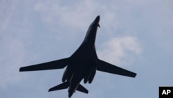 An B-1 Lancer bomber conducts a flyover in Washington July 4, 2020, in Washington. The B-21 is set to replace the Air Force’s B-1 and B-2 bombers, which have been around since the 1980s, part of modernization that Gen. C.Q. Brown Jr. says the U.S. needs.