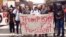 Protesters gather on the campus of the University of Connecticut to show their opposition to the election of Republican Donald Trump as president on Nov. 9, 2016 in Storrs, Conn.