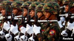 FILE - Myanmar's military parade to mark the 72nd Armed Forces Day in the capital Naypyitaw, Myanmar, March 27, 2017. 