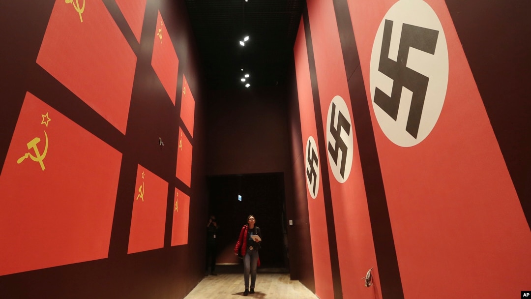 A woman looks at an exhibit in the Museum of the Second World War, an ambitious new museum under creation for nine years has opened its doors for a day to historians, museums and reporters in Gdansk, Poland, Jan. 23, 2017. 