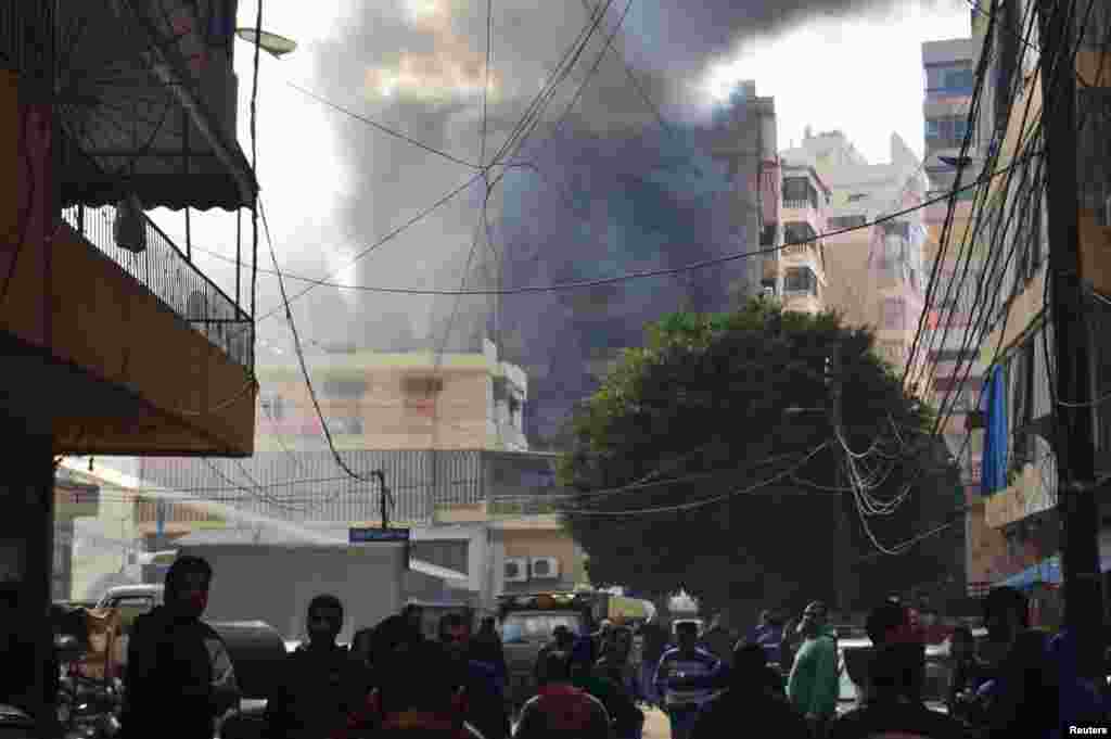 Smoke rises from the site of an explosion in Haret Hreik, Beirut, Jan. 21, 2014.